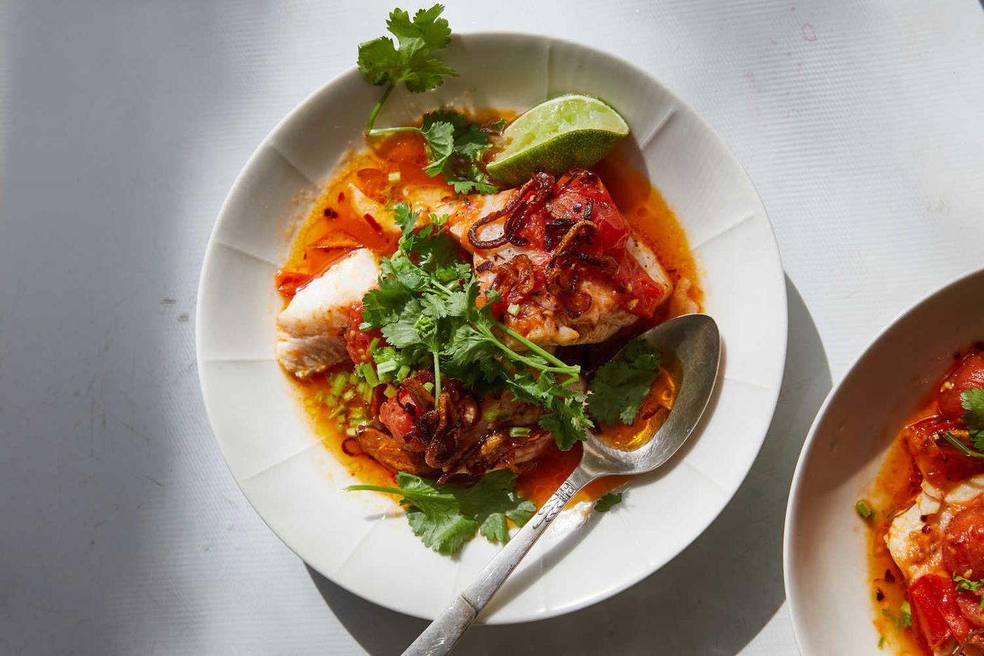 Recipe of Tomato-Poached Fish With Chile Oil and Herbs by NYT Cooking